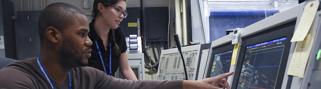 students at work at the nuclear reactor