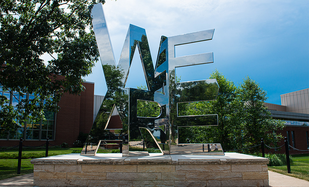 Metal sculpture of the words We Are